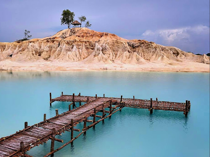 Keindahan Wisata Danau Biru Kawal